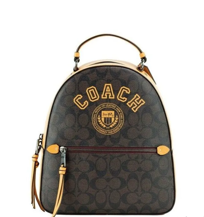 COACH Women's Varsity Brown Buttercup Signature Coated Canvas Jordyn Backpack